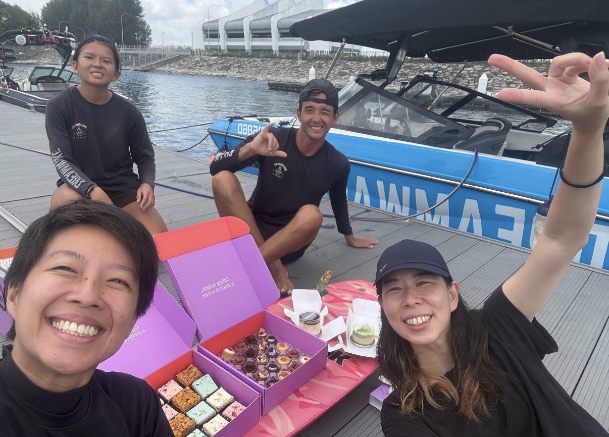 Friends enjoying wakesurfing birthday activity at Marina Country Club Singapore